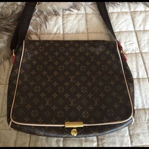Look alike LV briefcase with shoulder strap.