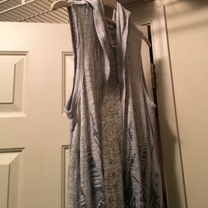 Spring sleeveless duster top