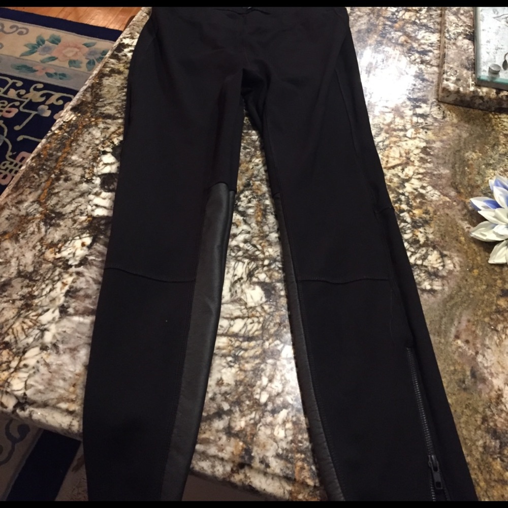 Madewell black stretch pants with leather accents
