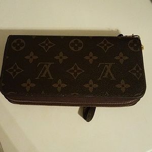 LV wallet with wrist strap