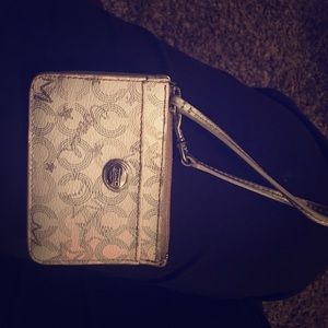 White leather coach keychain wallet