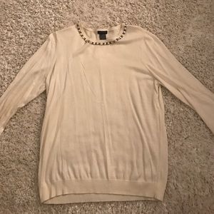 Cream Ann Taylor sweater with jeweled neckline.