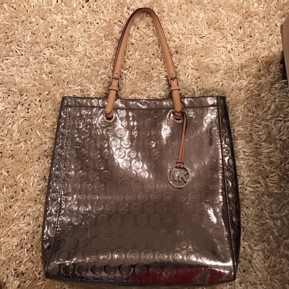 Michael Kors metallic tote in mint condition.