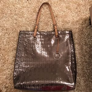 Michael Kors metallic tote in mint condition.