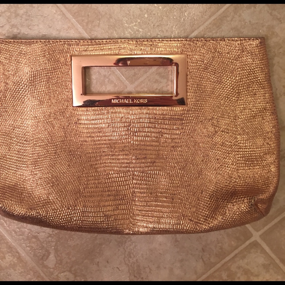 Michael Kors handled clutch.