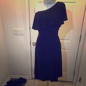 Flirty black ruffled cold shoulder dress