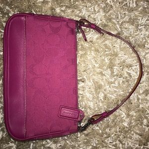Pink Coach purse.