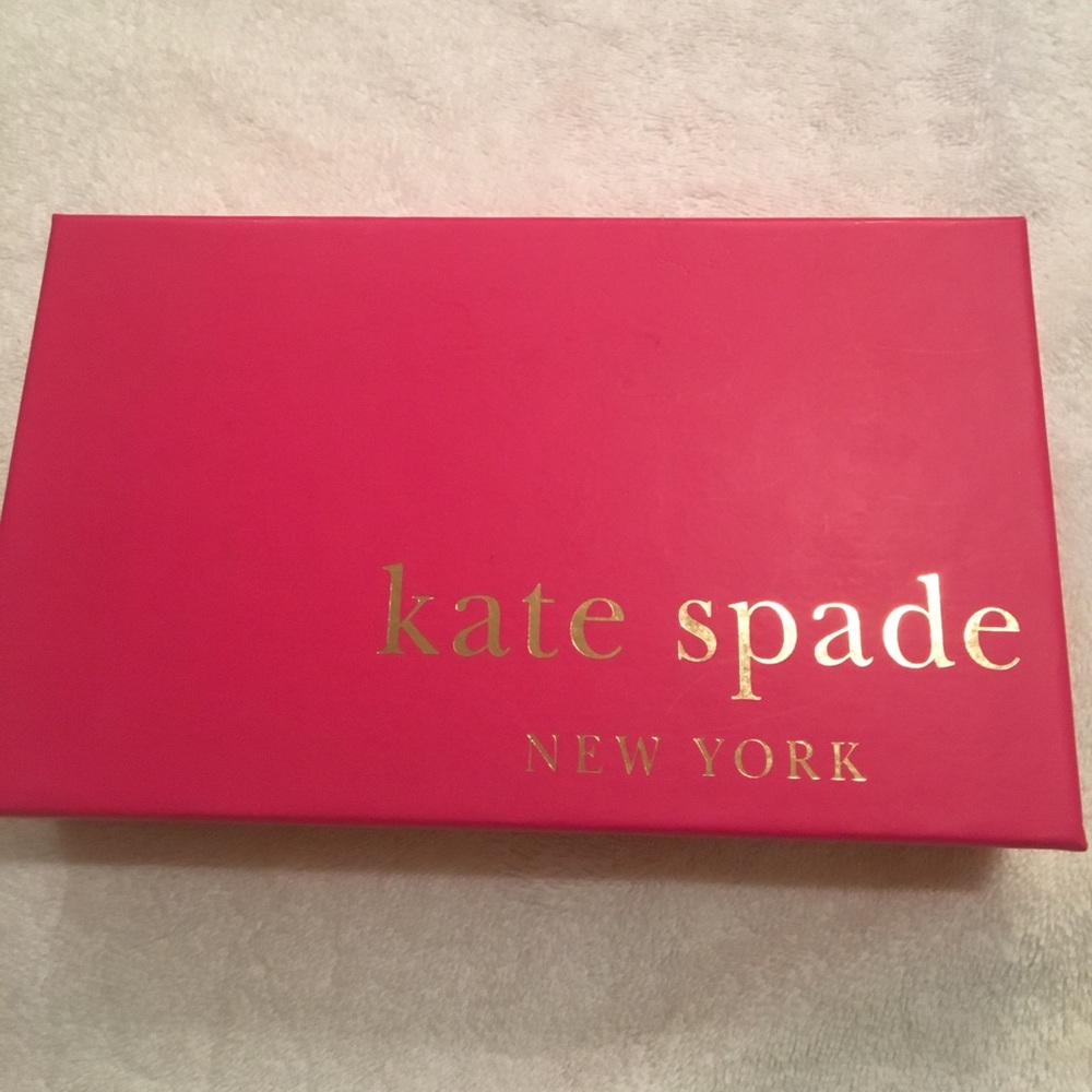 Kate Spade cedar street Lacey clutch. Never used.