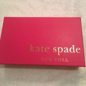 Kate Spade cedar street Lacey clutch. Never used.