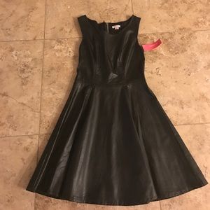 Faux leather mini dress.  NWT.