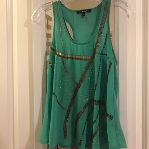 Green and gold tank