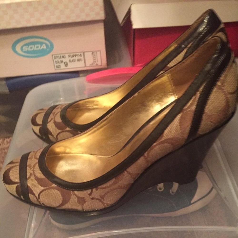 Coach wedges looks brand new. Worn twice.