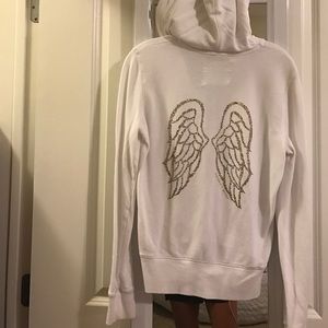 PINK white sweater with gold wings