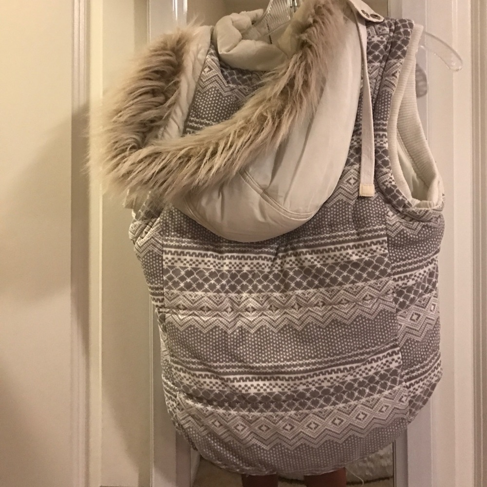 White fur vest