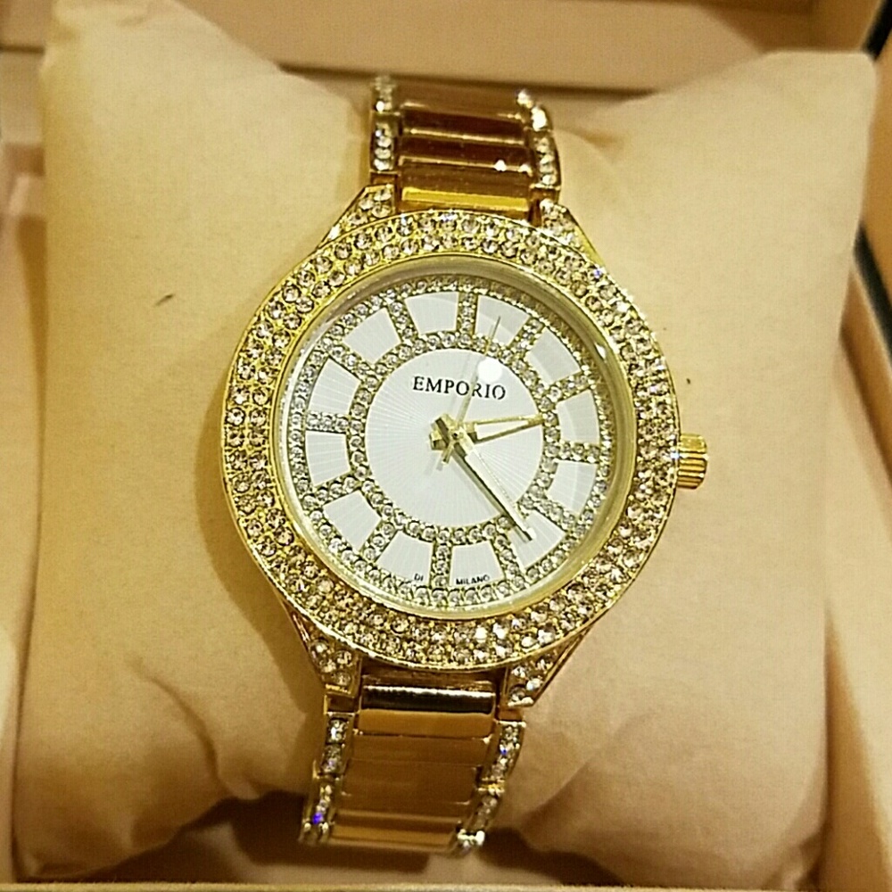 Women's gold studded watch.