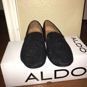 Black flats with rhinestone detail