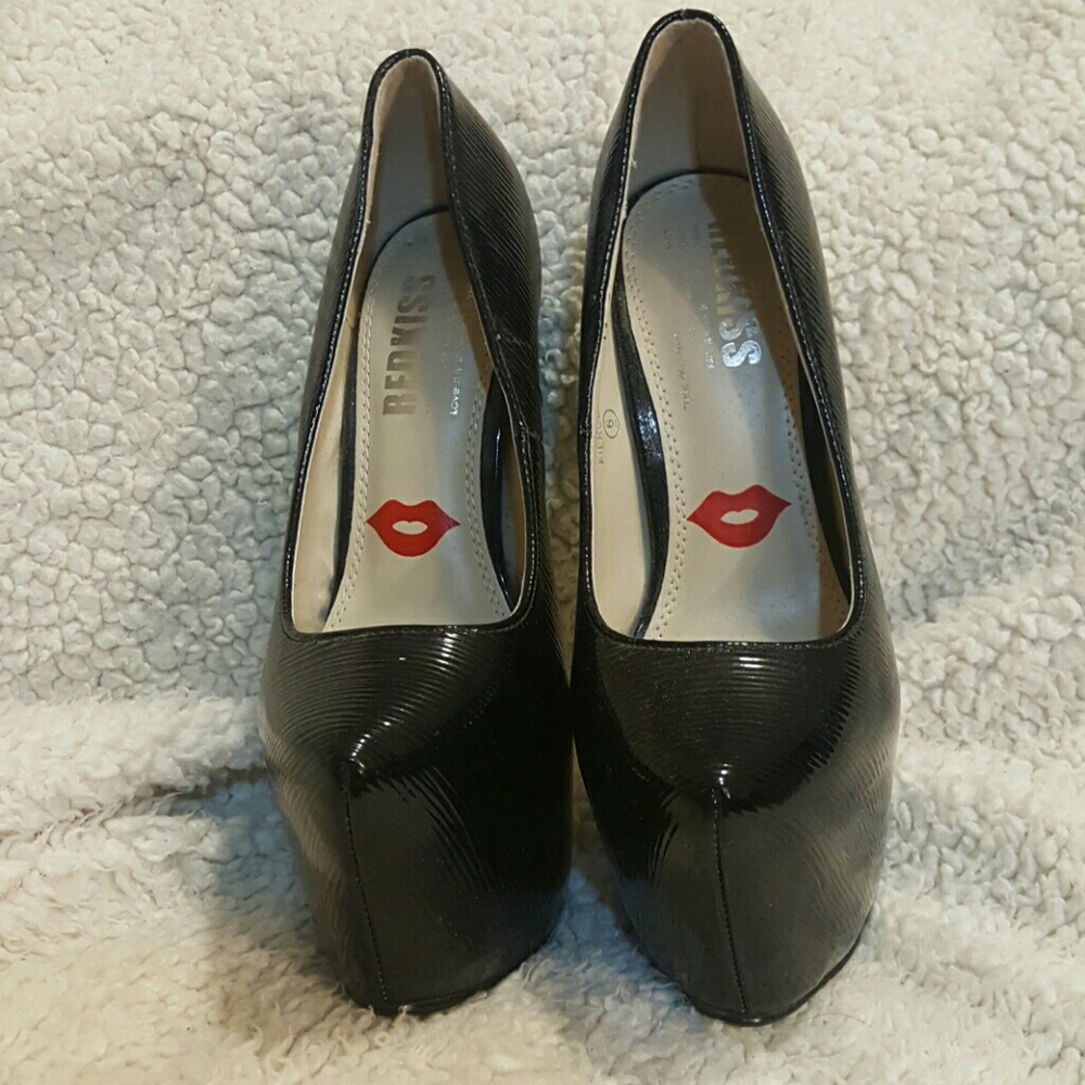 Black platform pumps