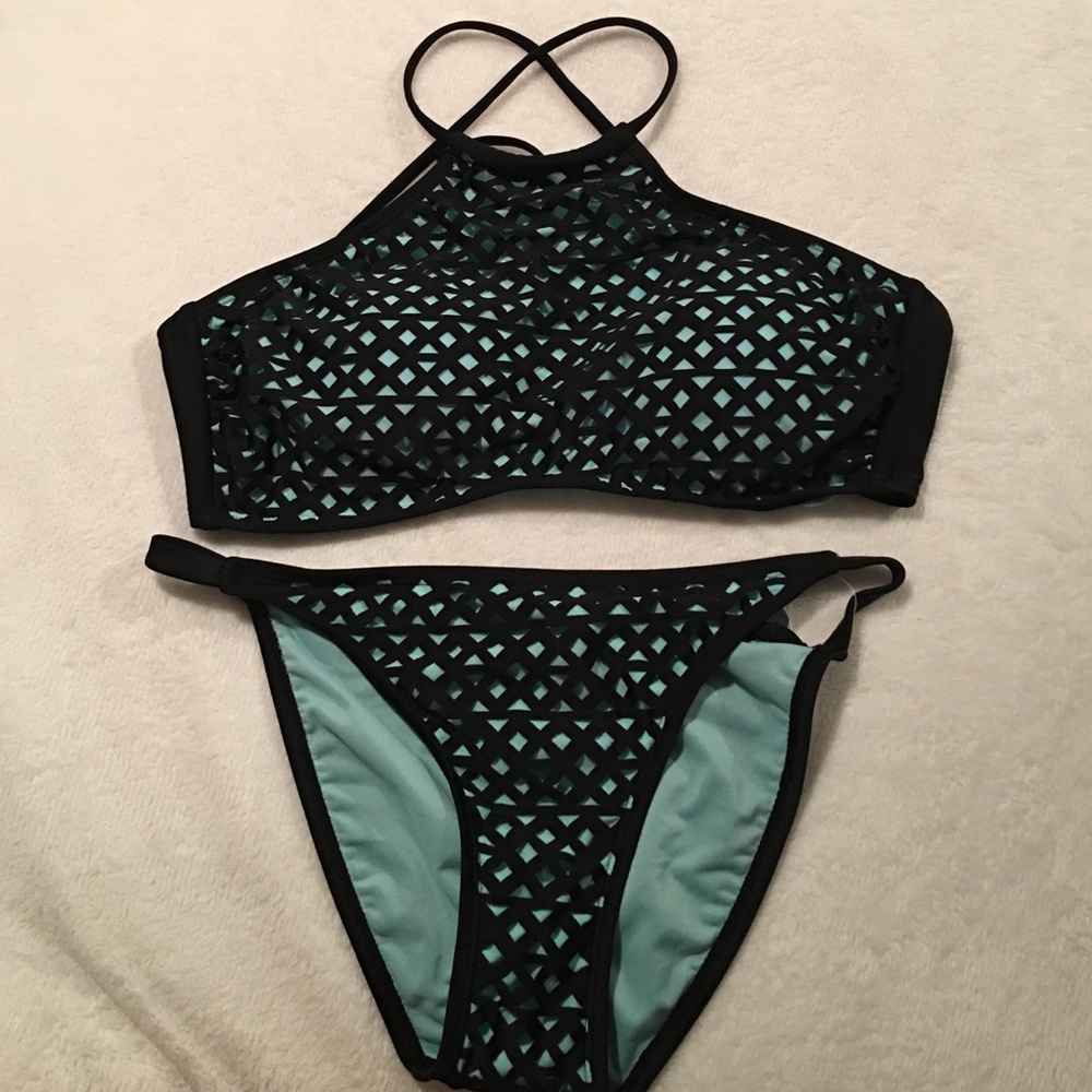 NWT!!! 2pc set Laser Cut Hi Neck Top & Tab Bottom.