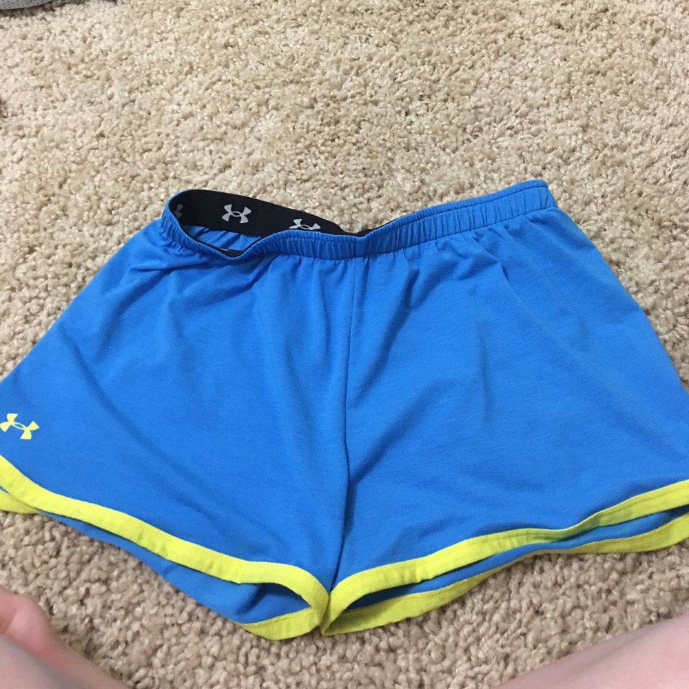 Blue and green under armor running shorts