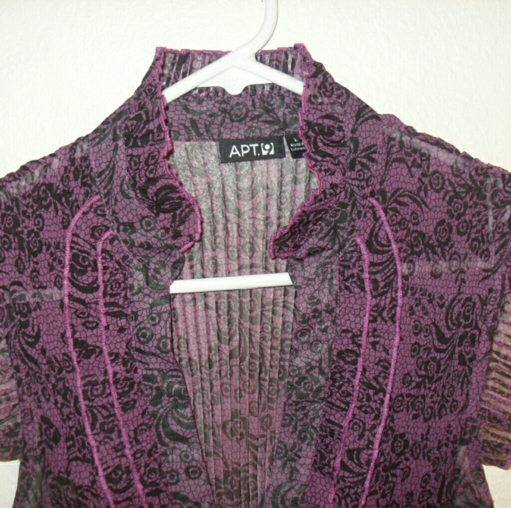 Sleeveless tuxedo style tunic top