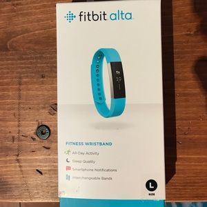 Aqua/Teal Fitbit Alta size large.