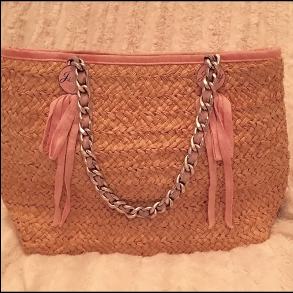 Juicy straw bag with pink ribbon and accents