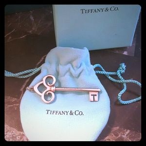 Authentic Tiffany & Co. Fleur-de-lis Key Pendant