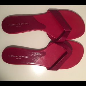 Red size 9 flip flops