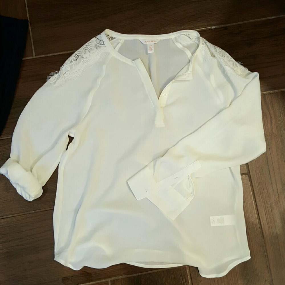 Lightweight ivory top with lace shoulder detail ??