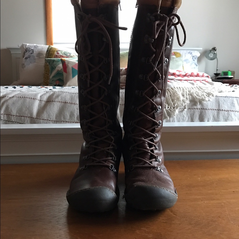 A used pair of brown Keene winter boots.