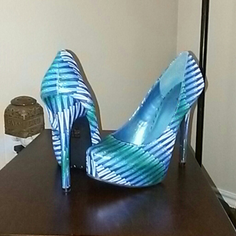 2 pairs of Sexy designed heels...
