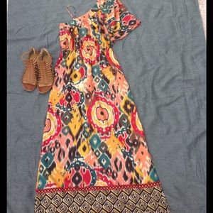 One shoulder. Tribal print maxi dress with slit.