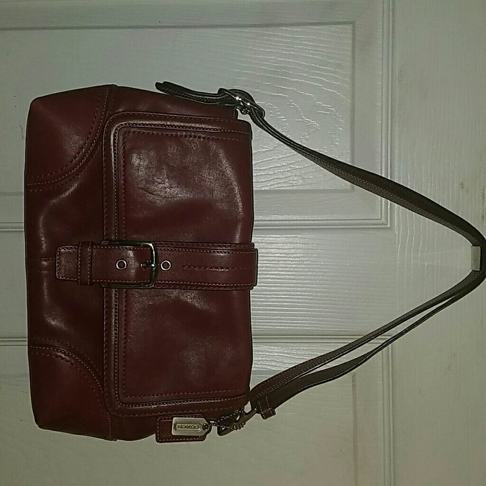 Coach leather pocket book.