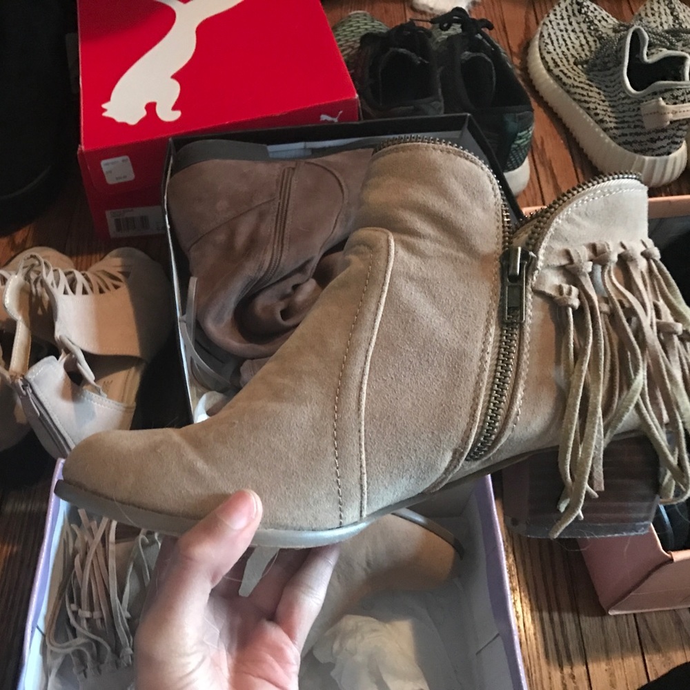 taupe colored booties with fringe
