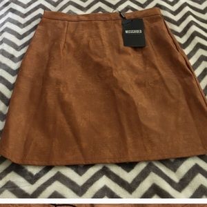 Cute camel colored skirt. No longer has tag