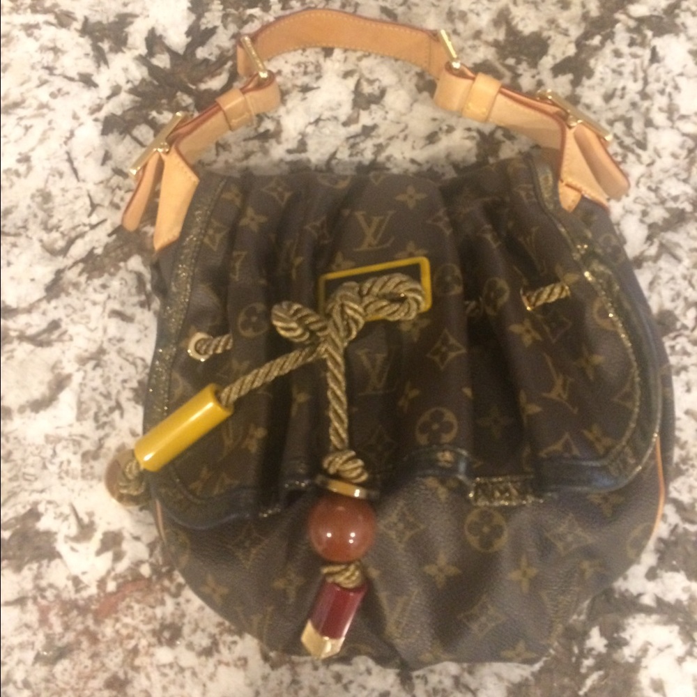 Louis Vuitton. Limited edition  Pm medium size bag