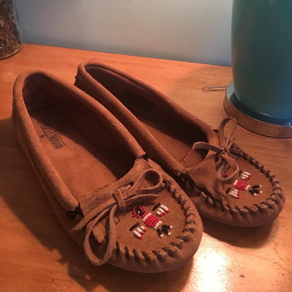 New Minnetonka moccasins. Size 8.5.