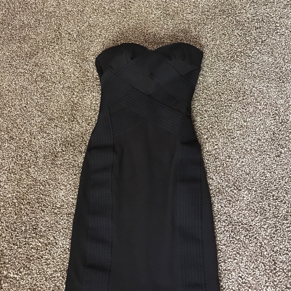 H&M little black dress. Size 4 however it fits 2