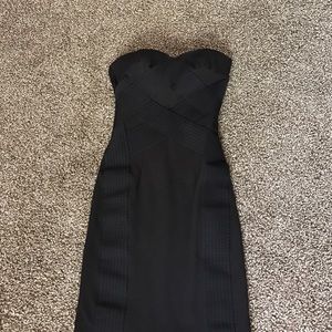 H&M little black dress. Size 4 however it fits 2