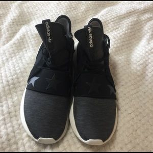 Authentic Adidas Ora Rita tubular shoes.