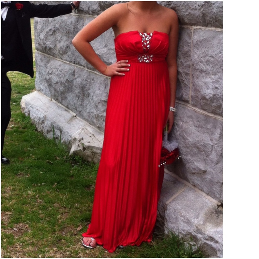 Red satin prom dress with embellishment.