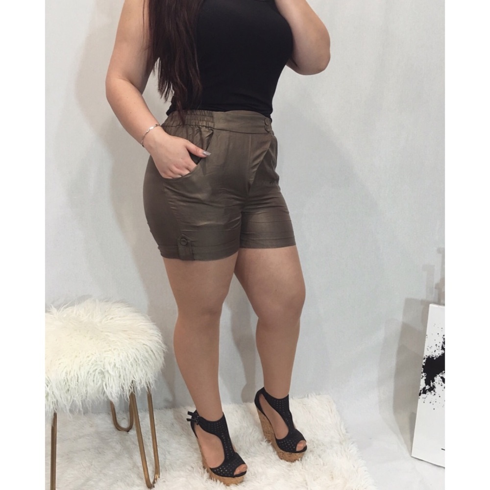 Olive high waisted shorts.