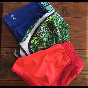 Packaged deal! 2 shorts and 1 pair of spandex.