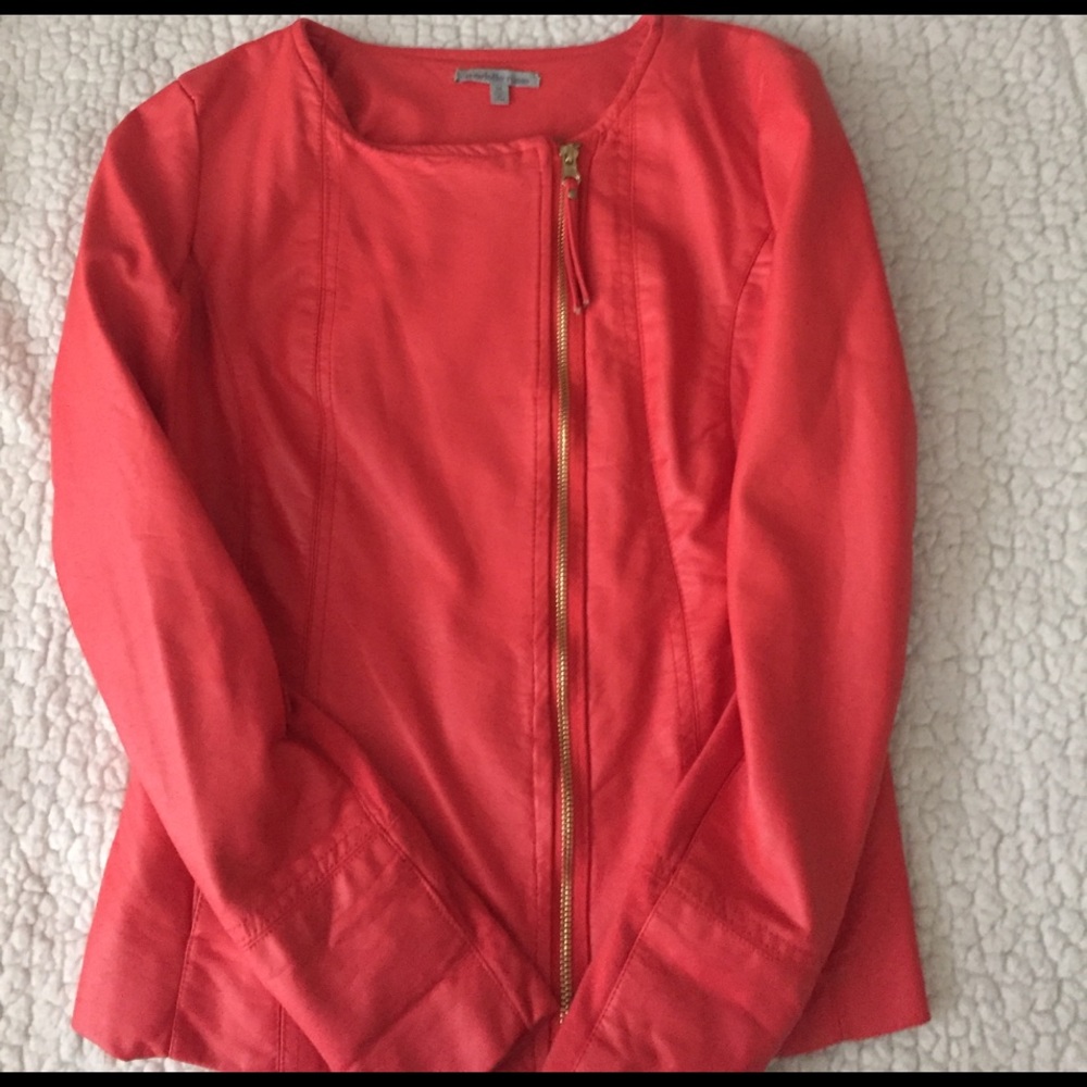 Faux leather orange colored jacket 💐