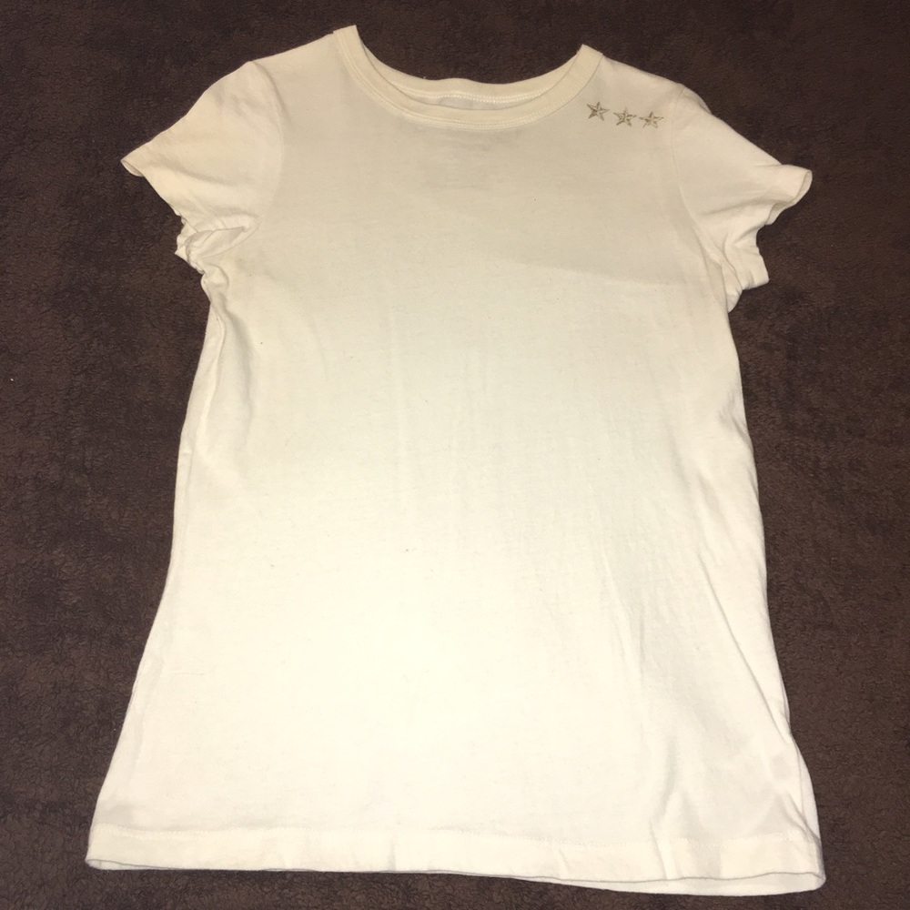 Off white tshirt with shiny gold wings on back