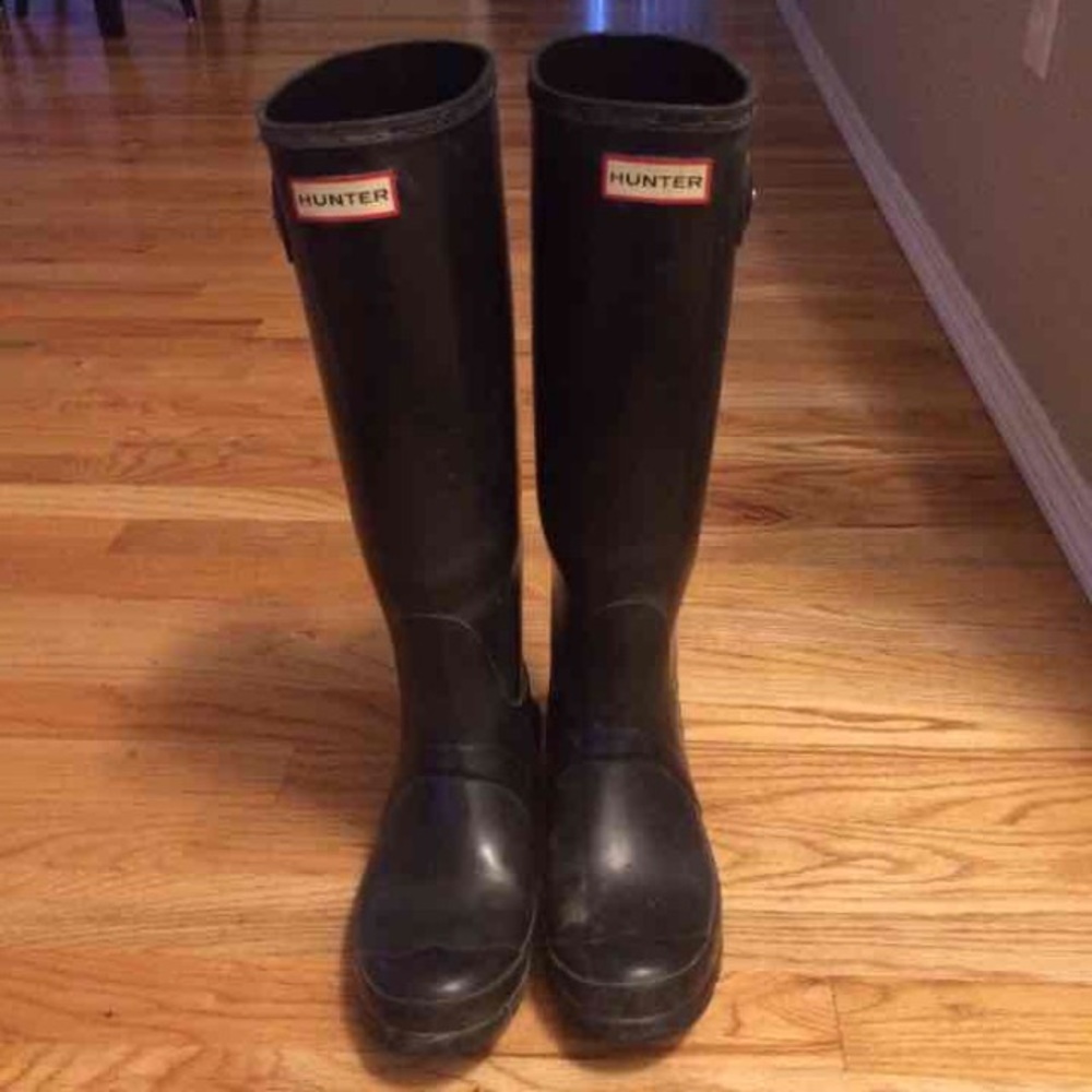 Tall black hunter boots