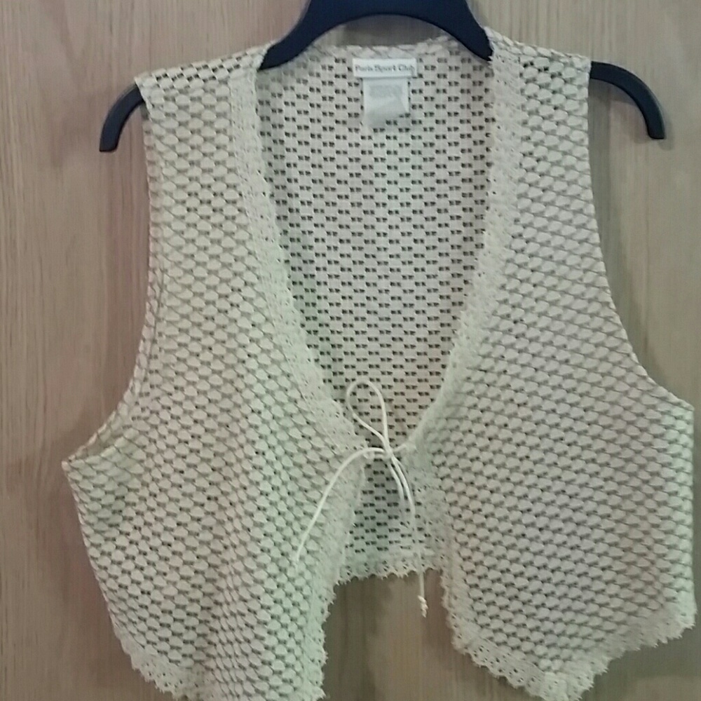 Cream colored vest