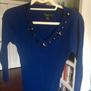 V-neck navy sweater with embellished neckline