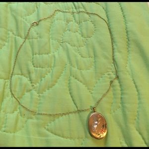 Golden necklace locket