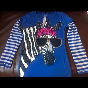 Barely used long sleeve shirt. Comfy and soft